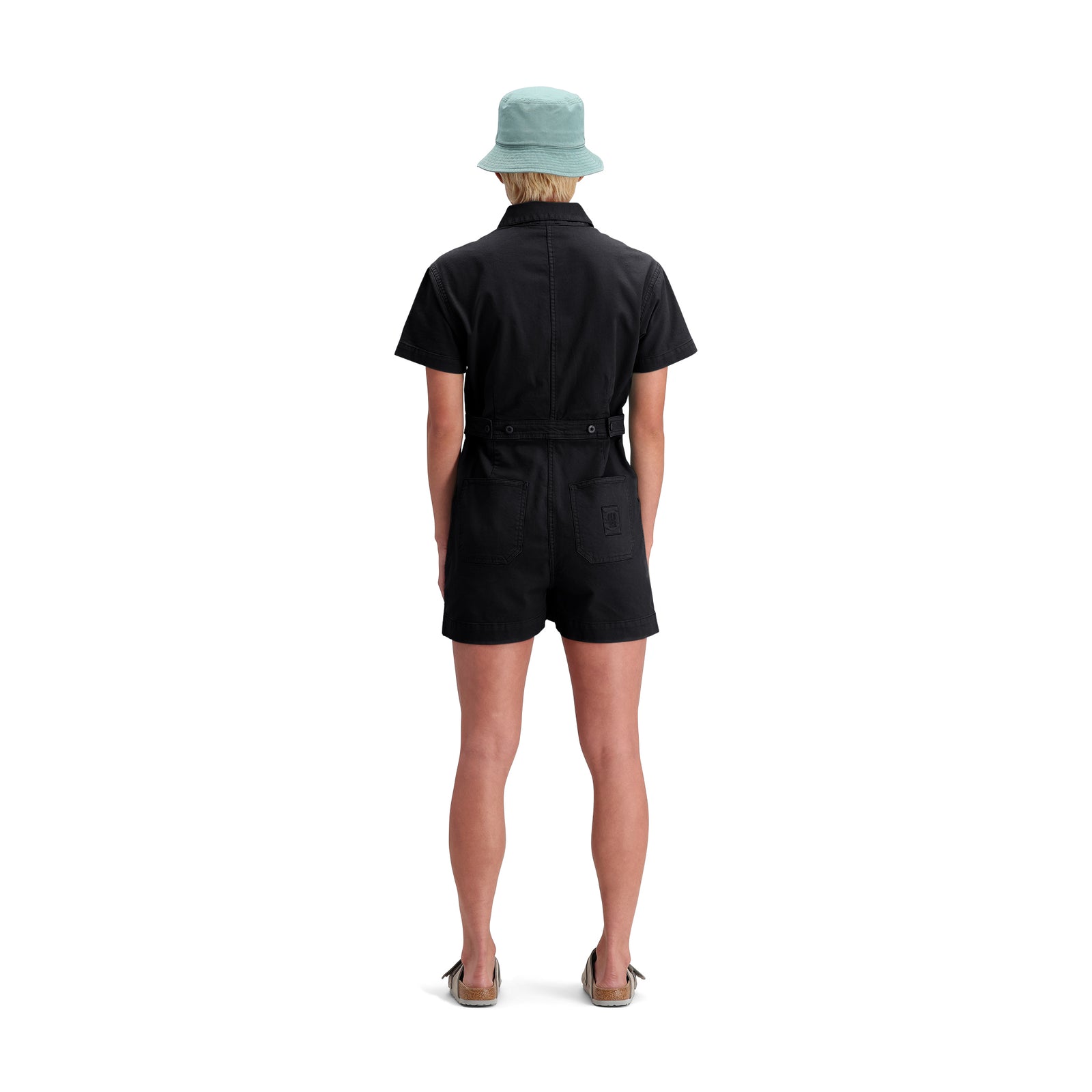 General back model shot of Topo Designs Dirt Romper - Women's in "Black"