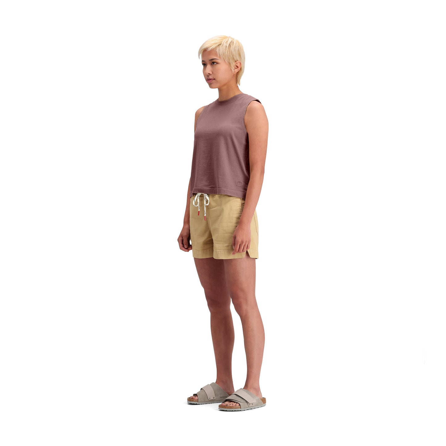 General side model shot of Topo Designs Dirt Tank - Women's in "Peppercorn"