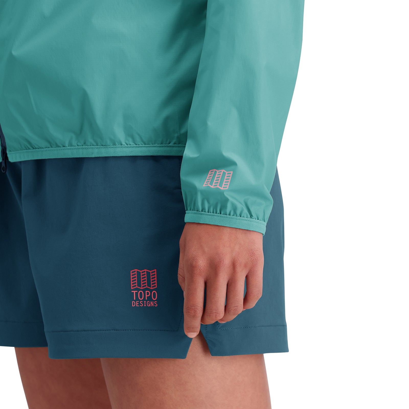 Detail shot of Topo Designs Global Ultralight Packable Jacket - Women's in "Caribbean"