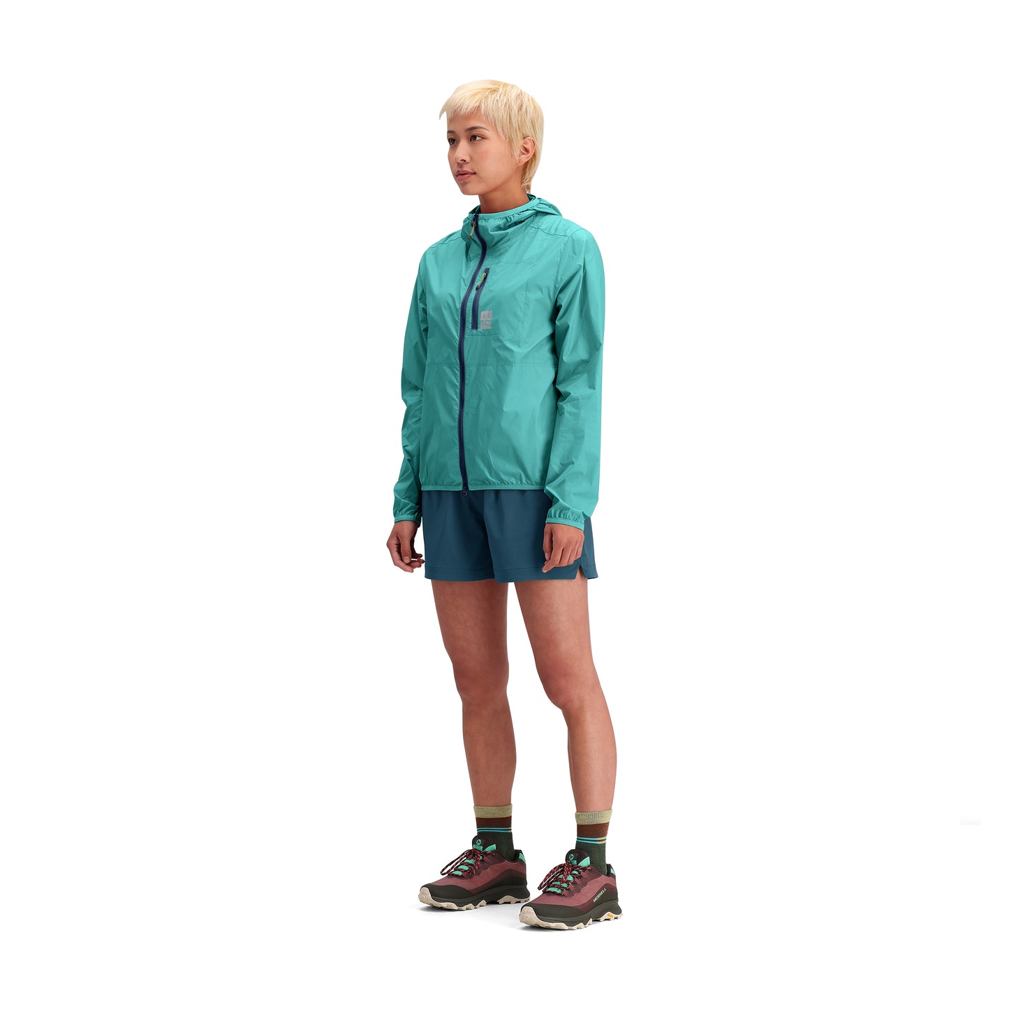 General side model shot of Topo Designs Global Ultralight Packable Jacket - Women's in "Caribbean"