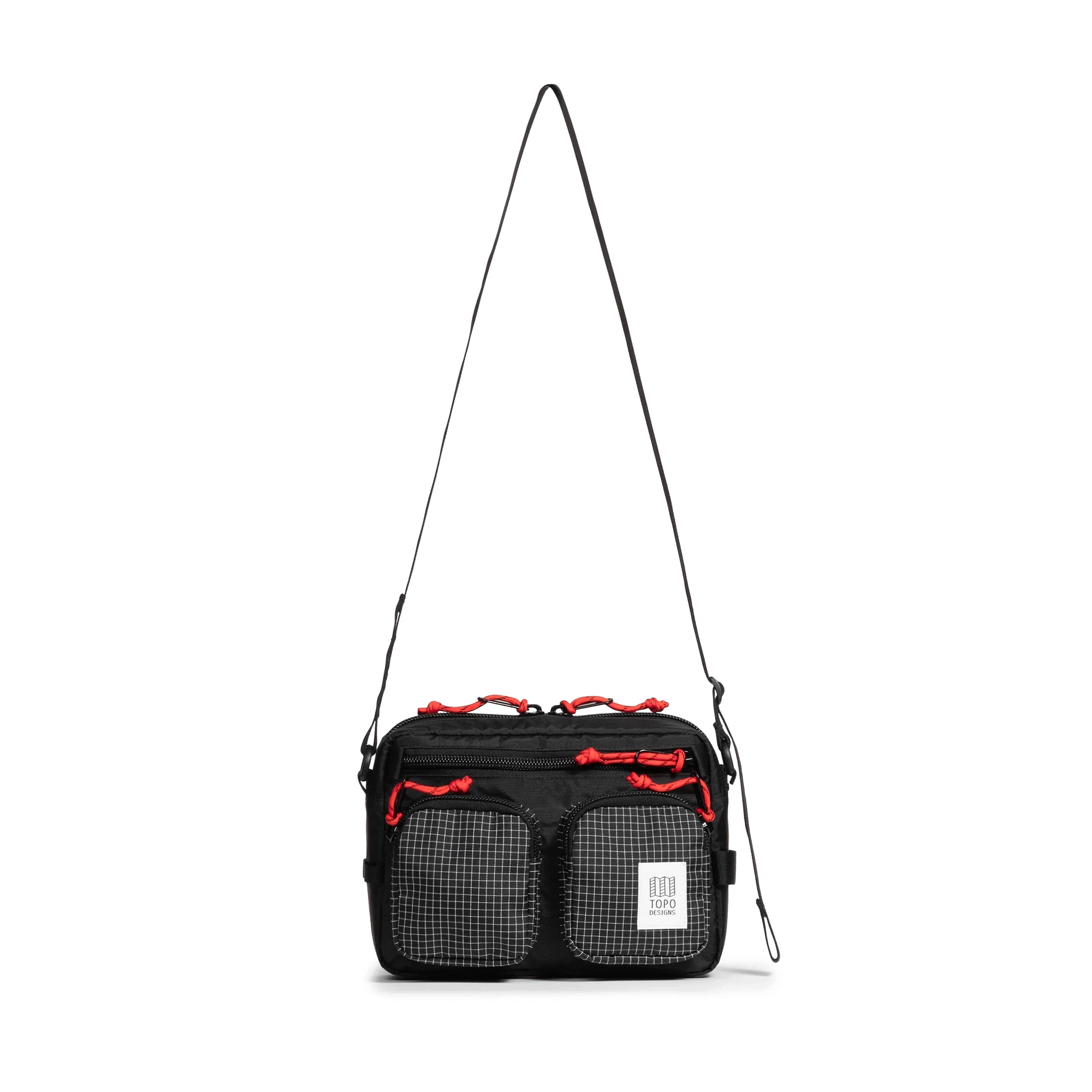 Front view of Topo Designs Block Bag in "Black / White Grid"