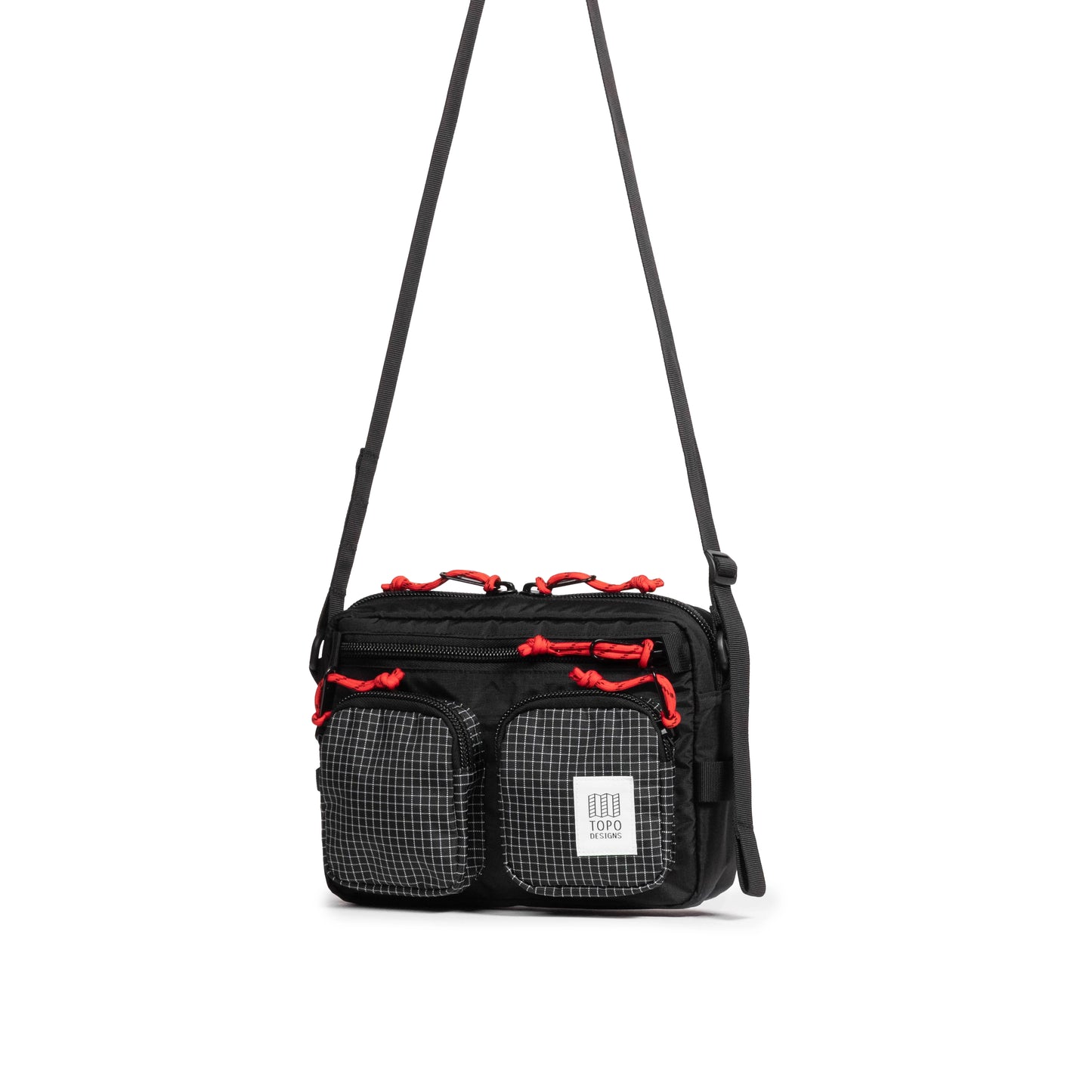 Front quarter view of Topo Designs Block Bag in "Black / White Grid"