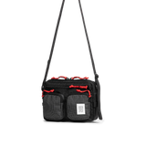 Front quarter view of Topo Designs Block Bag in "Black / White Grid"