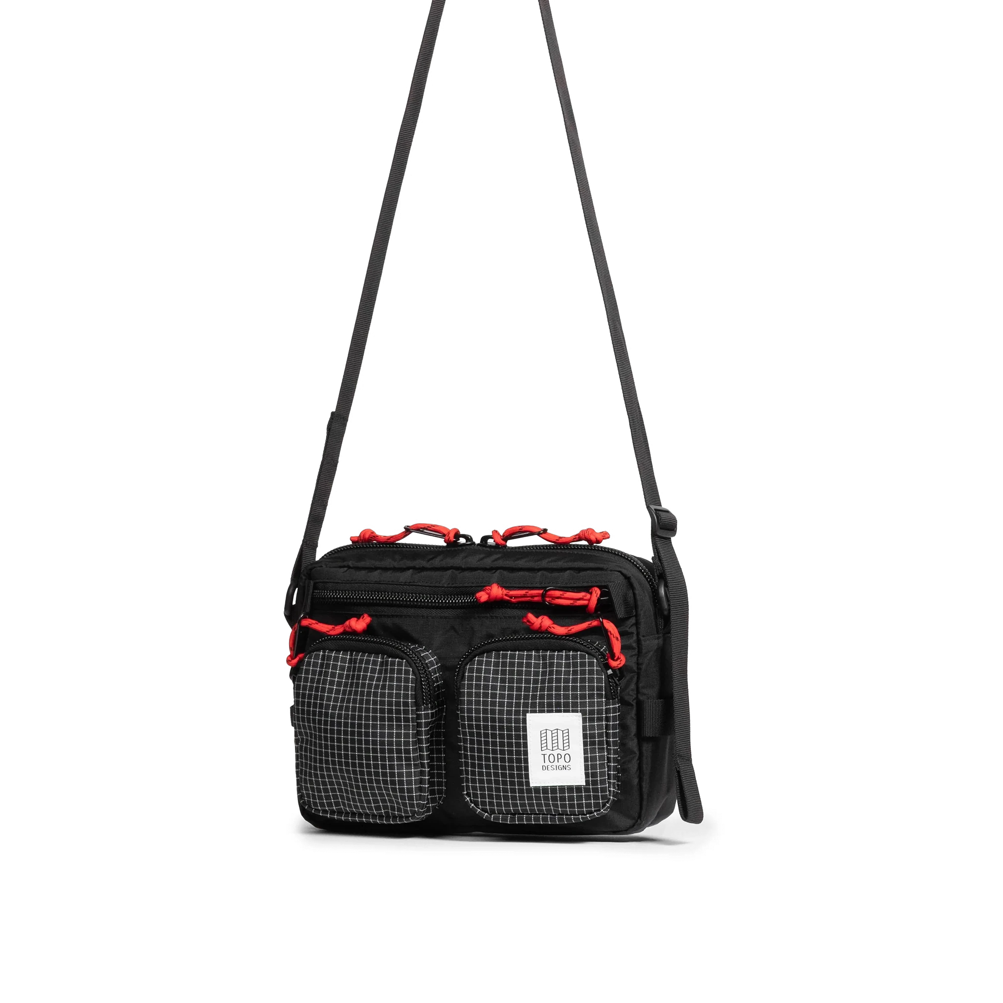 Front quarter view of Topo Designs Block Bag in "Black / White Grid"