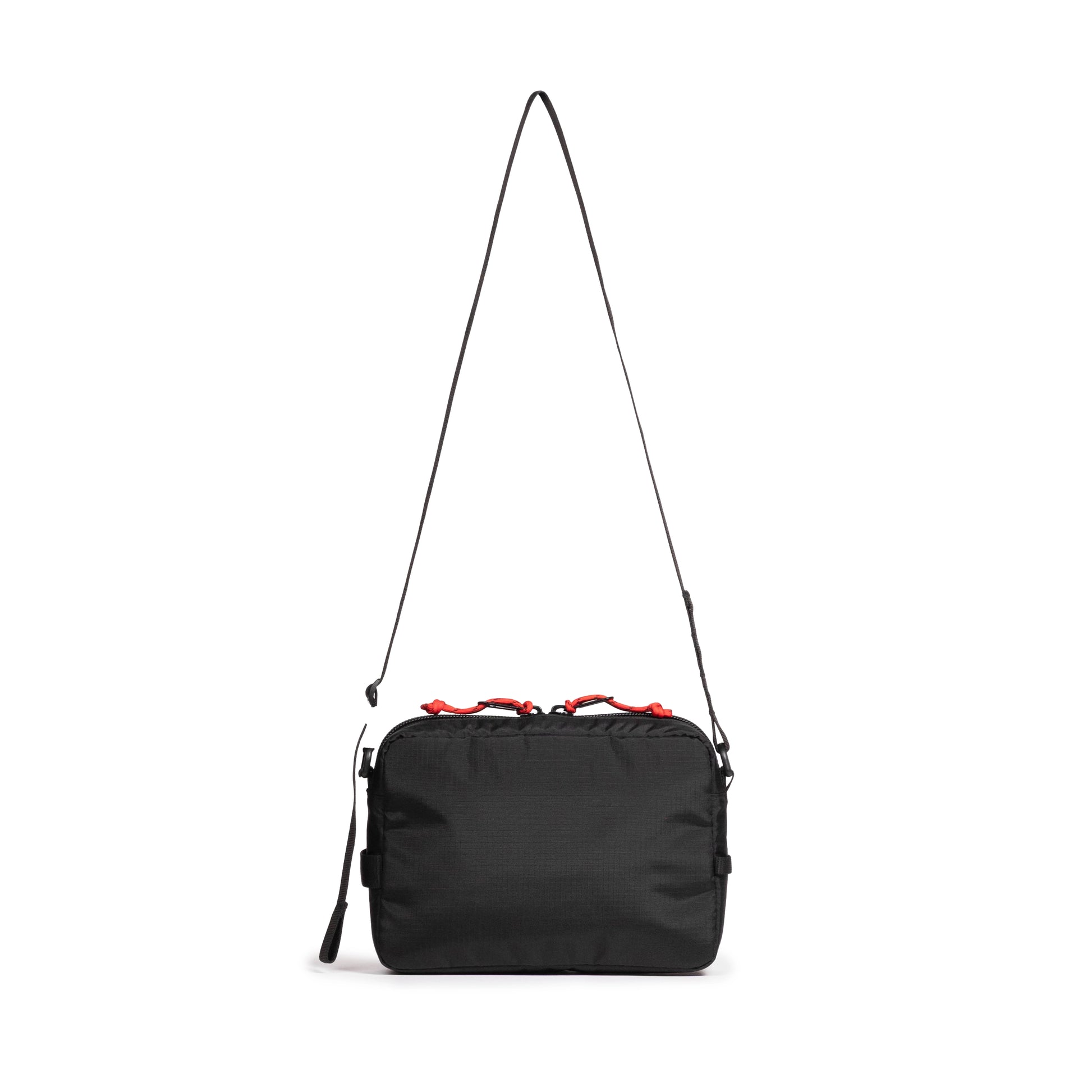 Back view of Topo Designs Block Bag in "Black / White Grid"