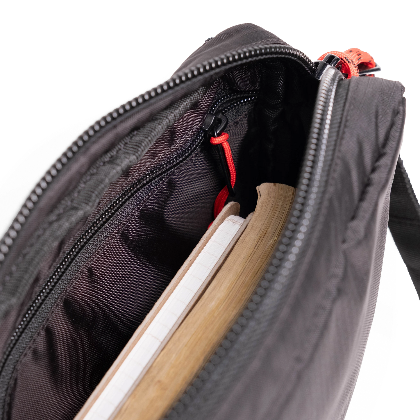 General interior view of Topo Designs Block Bag in "Black / White Grid"