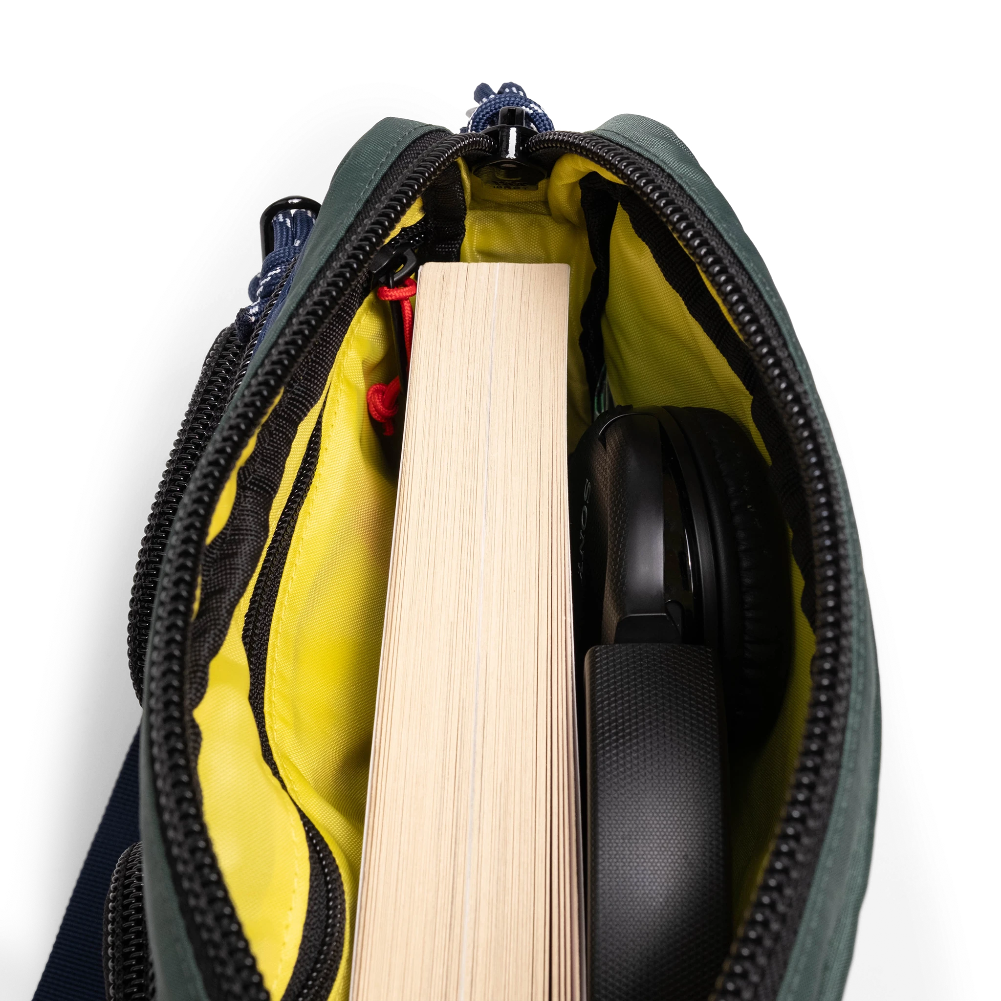 General interior view of Topo Designs Block Bag in "Forest / Bone White"