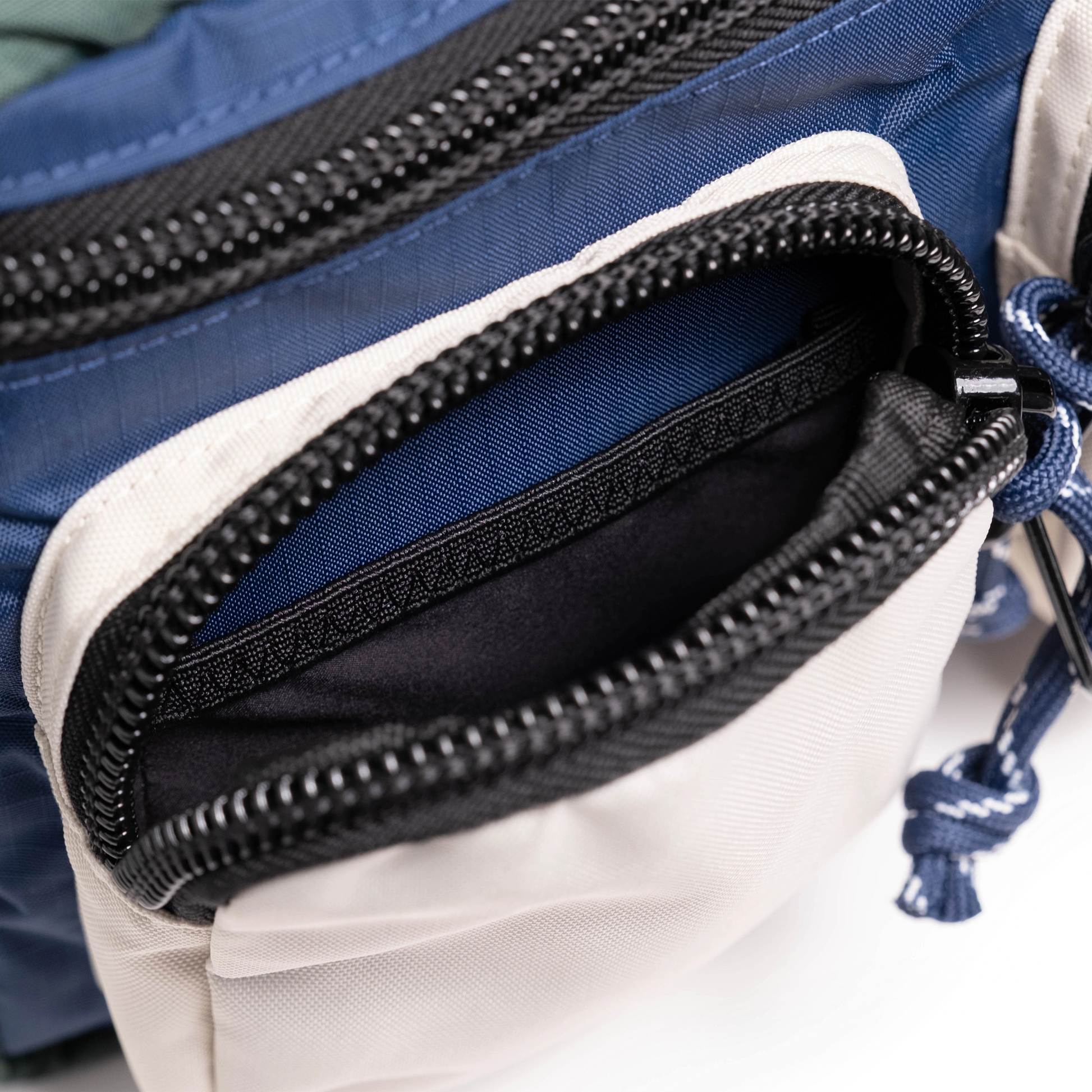 General interior view of Topo Designs Block Bag in "Forest / Bone White"