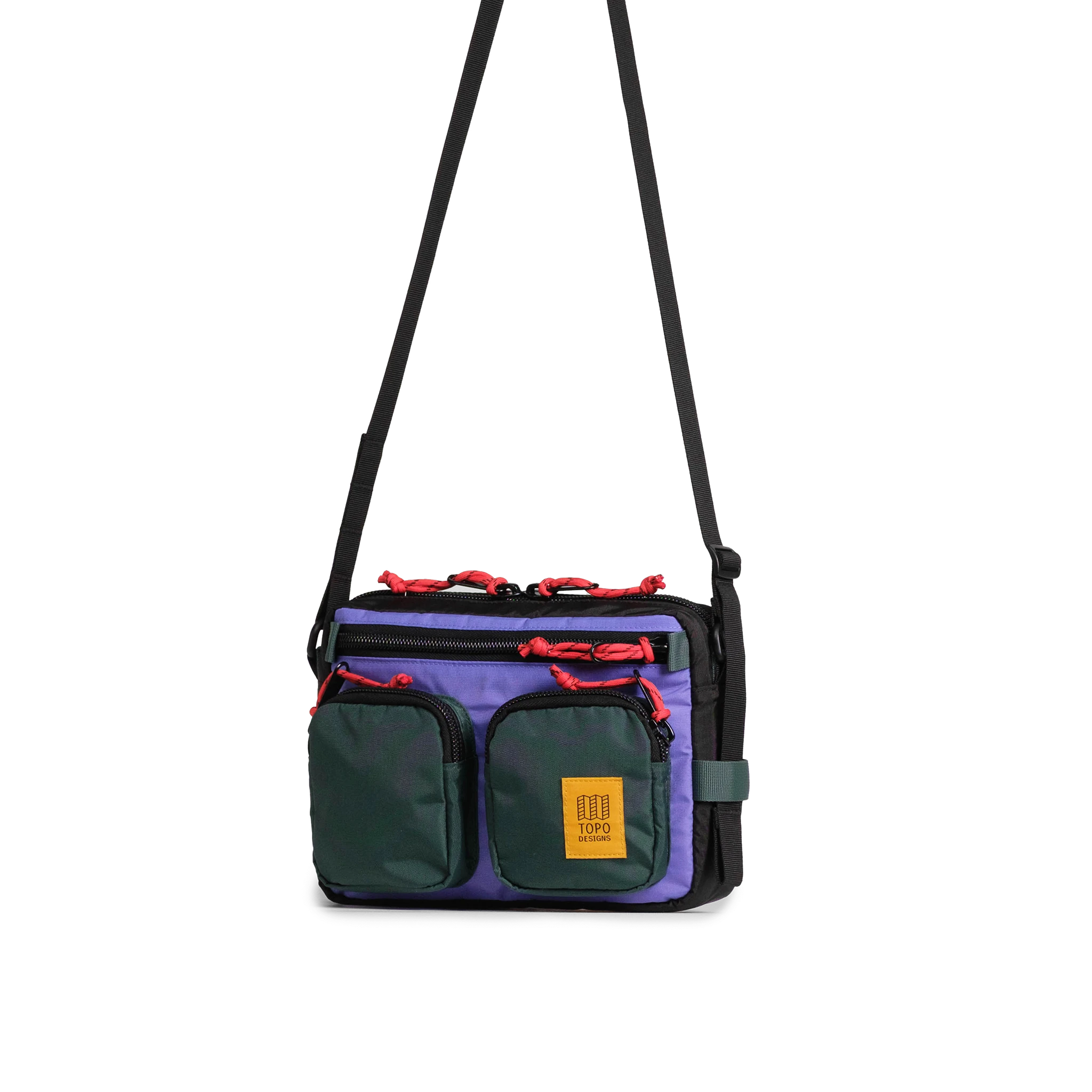 Front quarter view of Topo Designs Block Bag in "Very Peri / Forest"