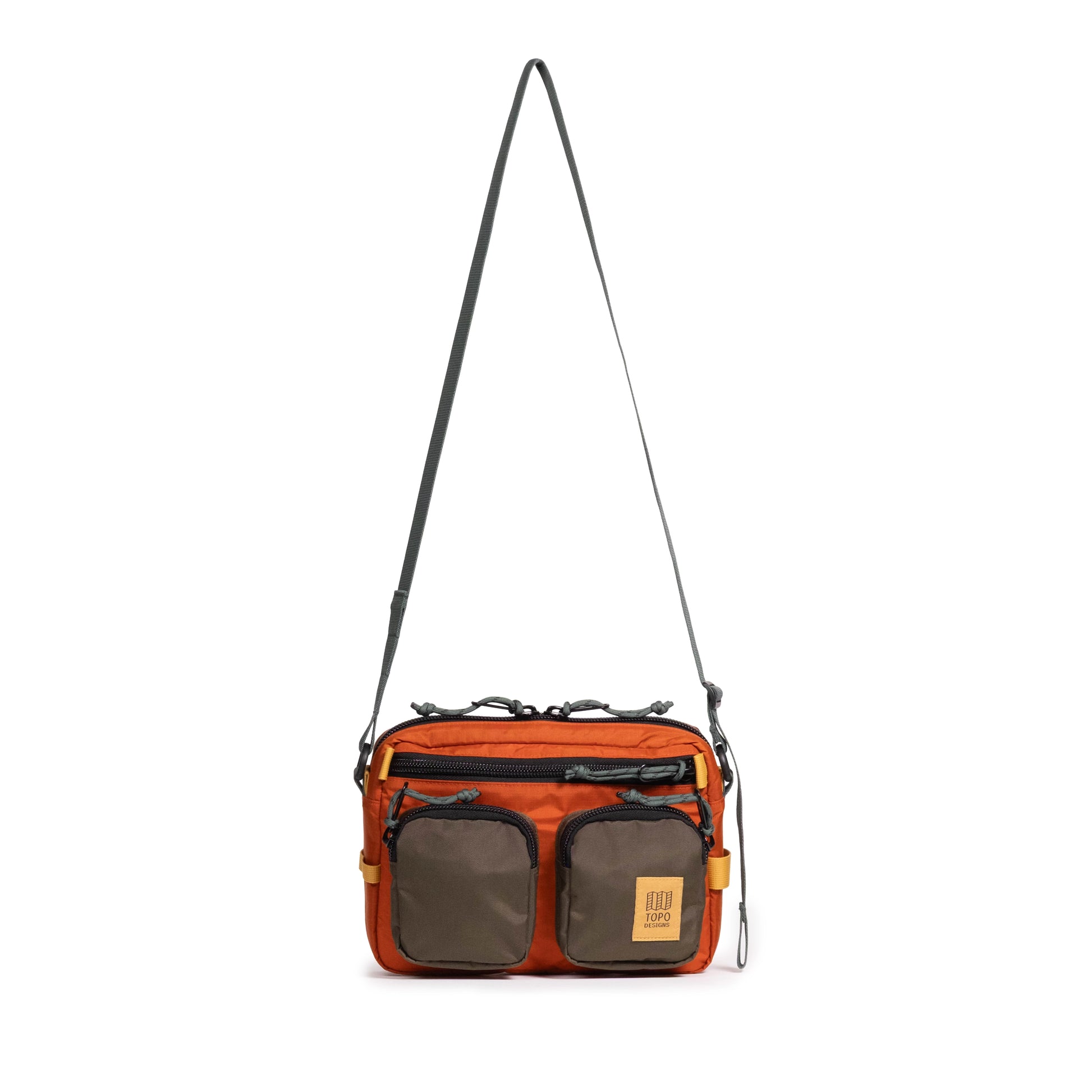 Front view of Topo Designs Block Bag in "Woodland / Terracotta"