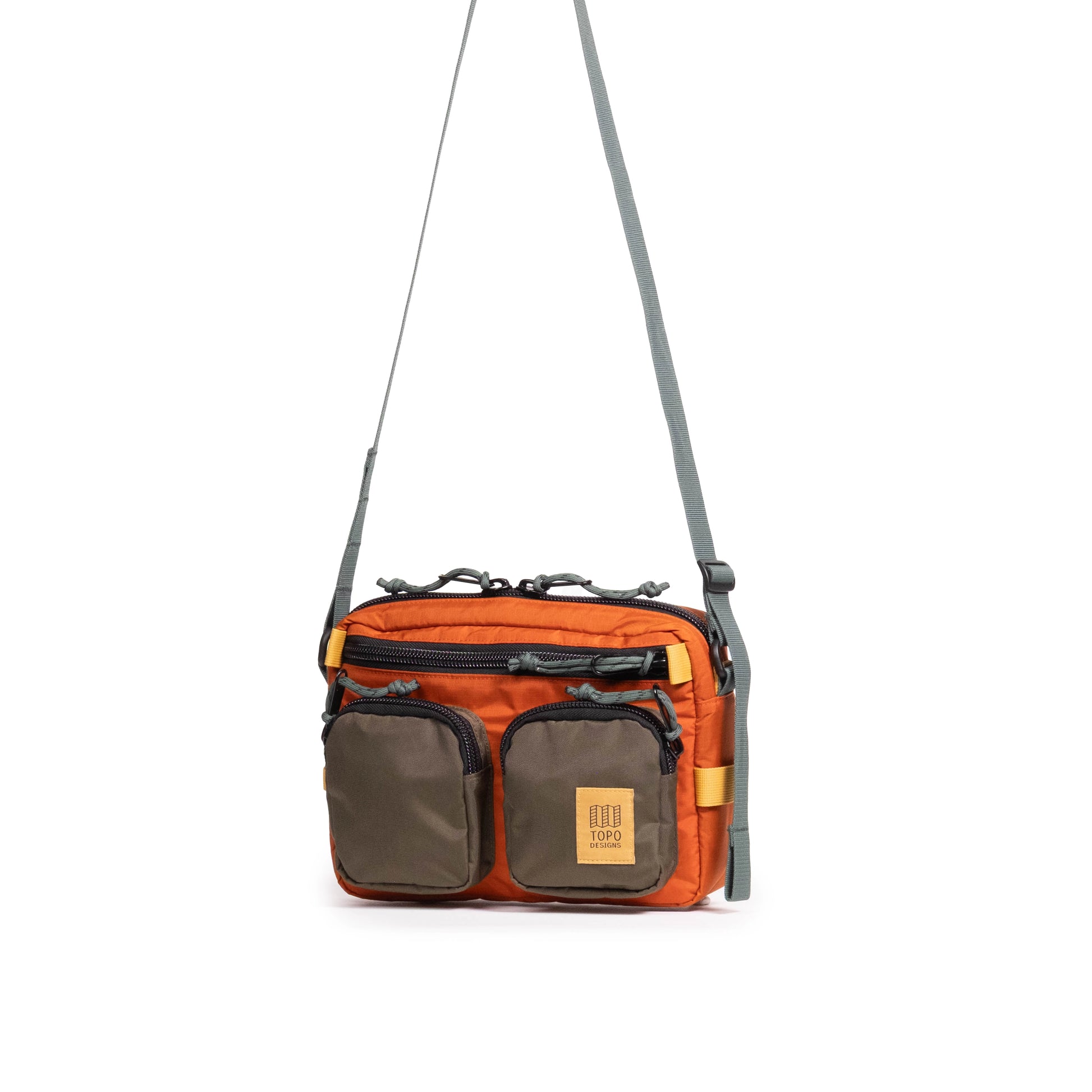 Front quarter view of Topo Designs Block Bag in "Woodland / Terracotta"