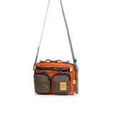 Front quarter view of Topo Designs Block Bag in "Woodland / Terracotta"