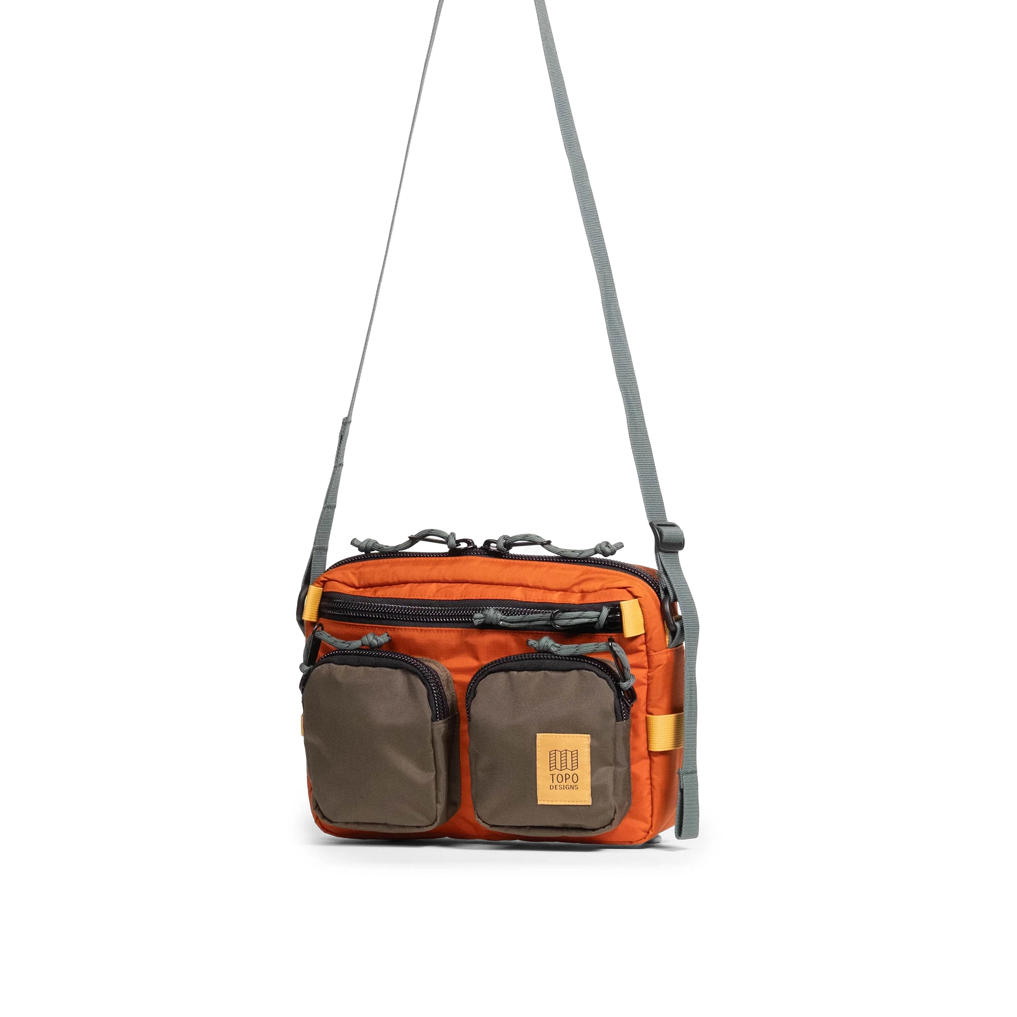 Front quarter view of Topo Designs Block Bag in "Woodland / Terracotta"