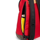General detail view of Topo Designs Classic Teardrop Backpack in "Salsa" with the side zippered access opened.