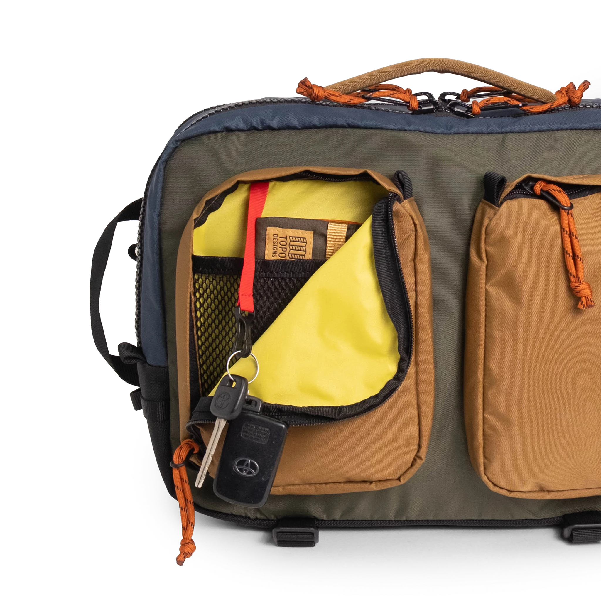 General full front product shot of the global briefcase showing use of the front zip pocket in "Olive / Dark Khaki".