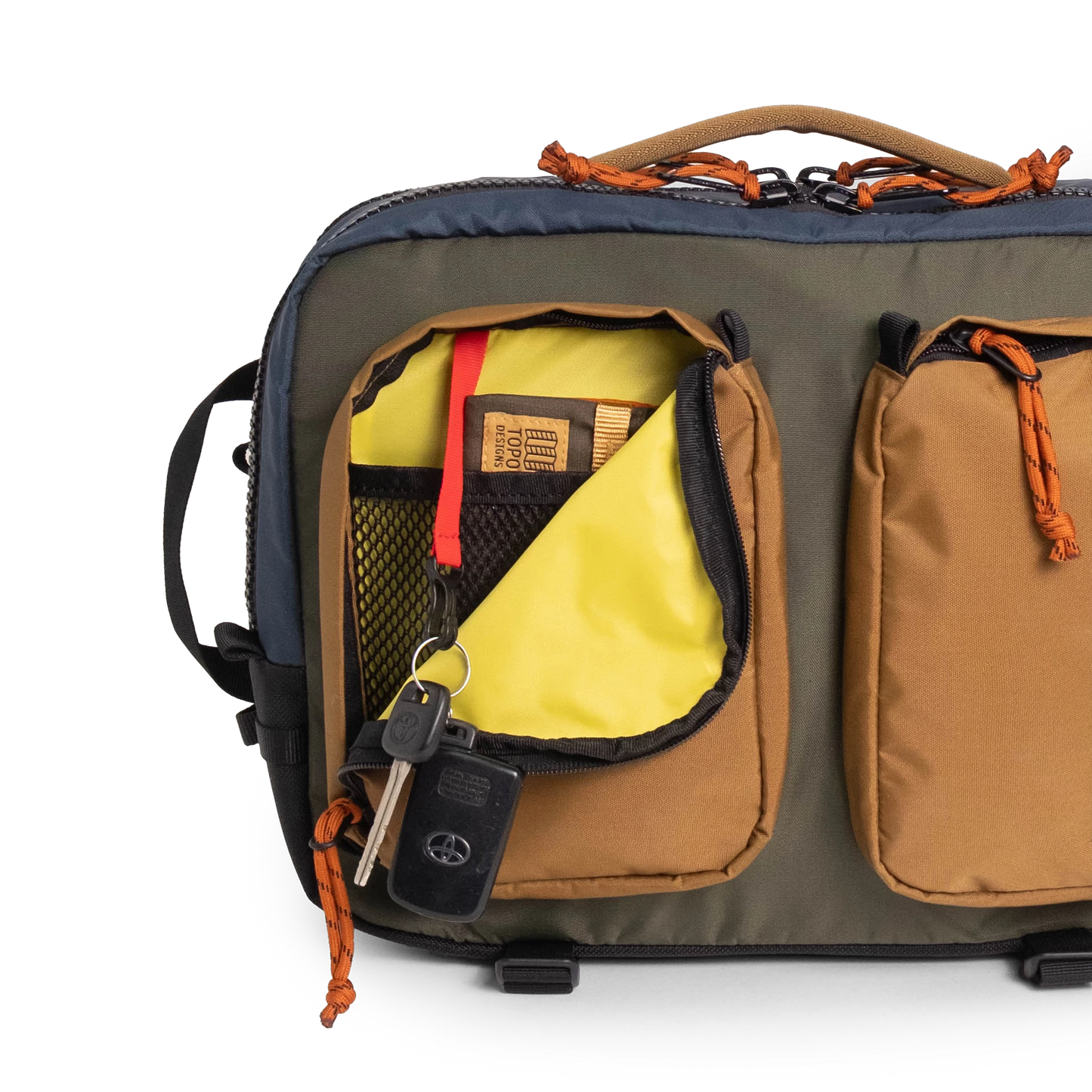 General full front product shot of the global briefcase showing use of the front zip pocket in "Olive / Dark Khaki".