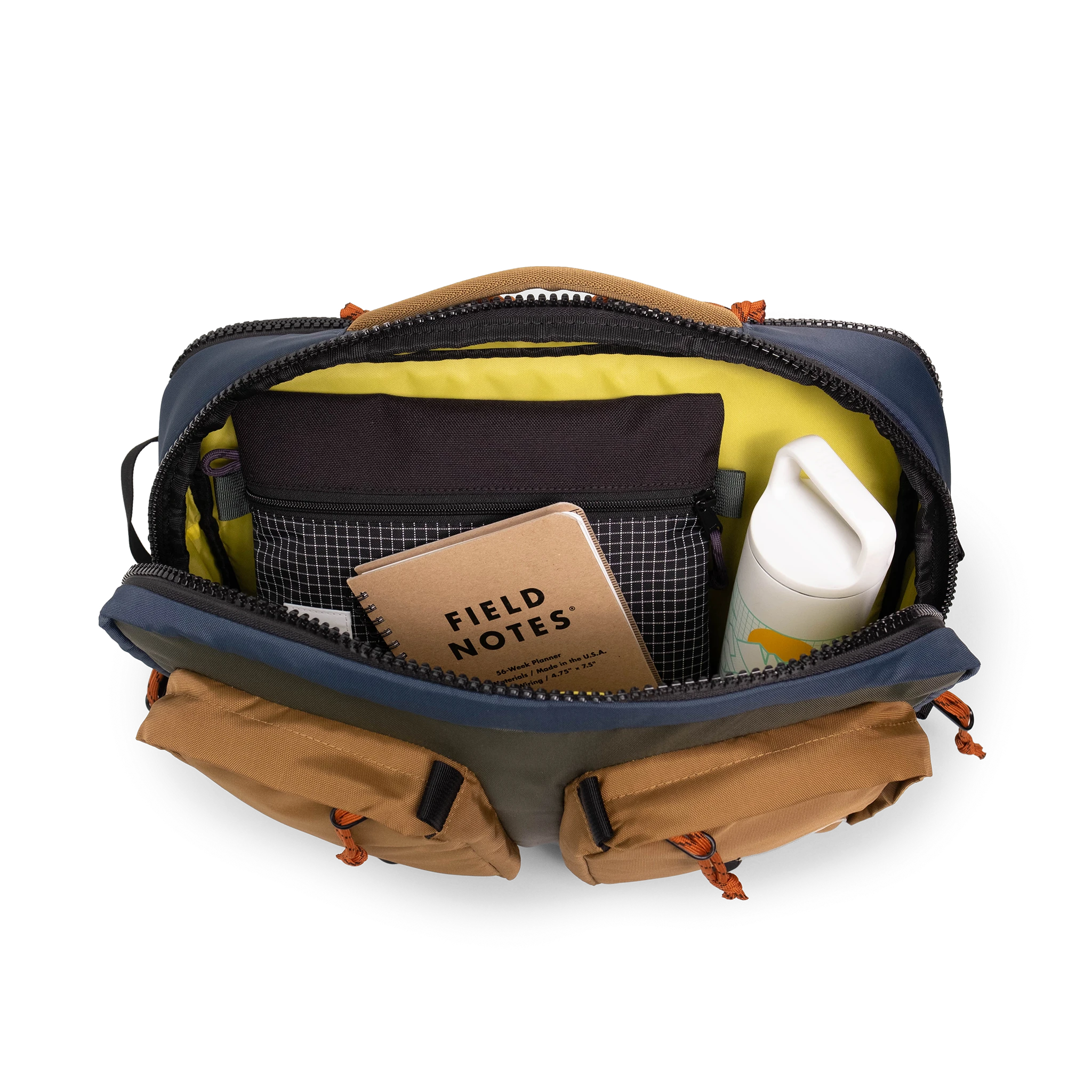 General detail product shot of the global briefcase in "Olive / Dark Khaki" showing the main compartment.