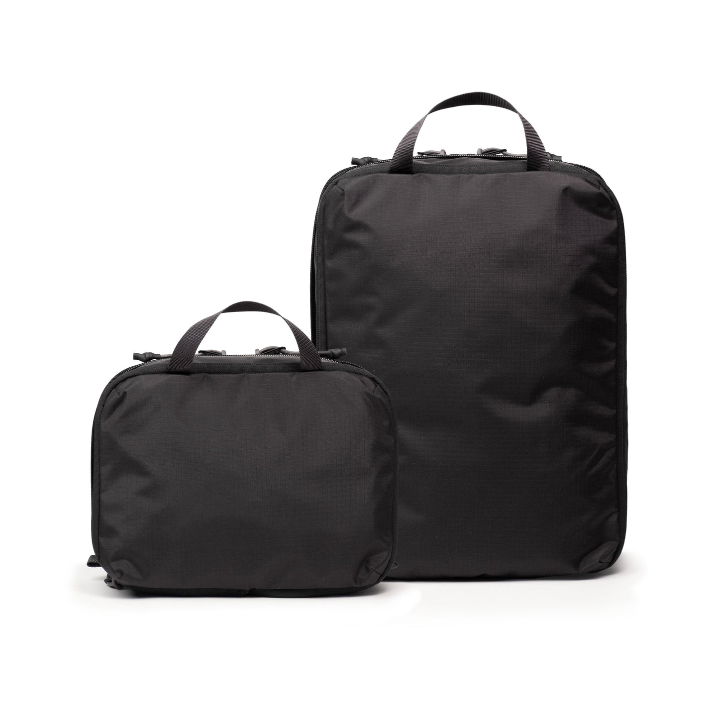 Back white background image of Topo Designs Global Compression Pack Bag Set in "Black / Black"