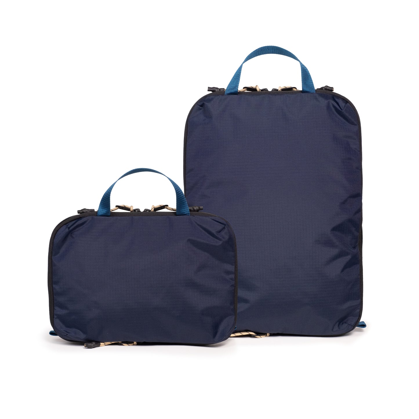 Back white background image of Topo Designs Global Compression Pack Bag Set in "Navy / Sahara"