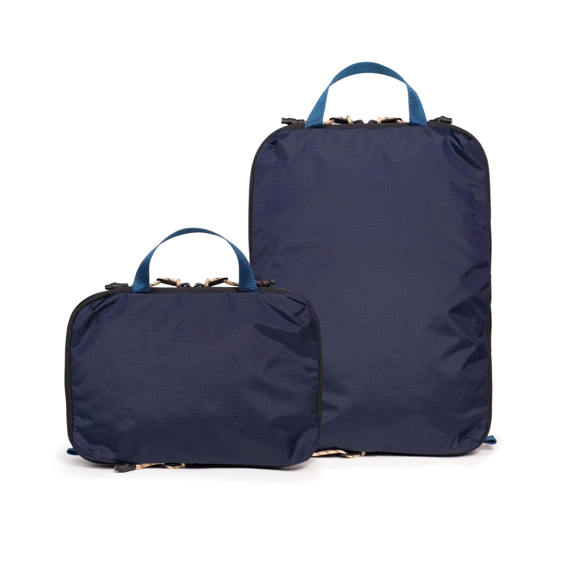 Back white background image of Topo Designs Global Compression Pack Bag Set in "Navy / Sahara"