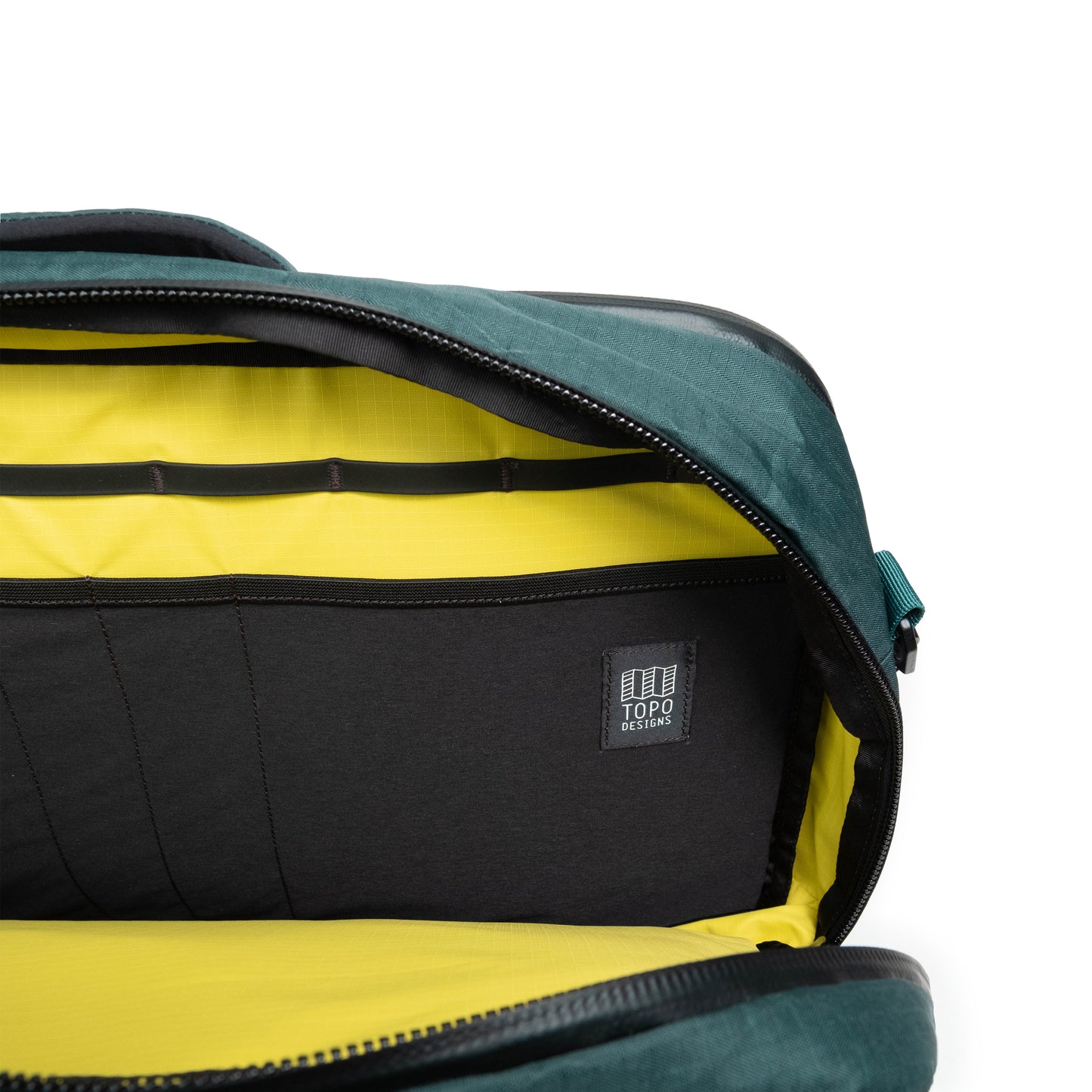 General shot of Topo Designs Global Pro 3-Way Briefcase showing interior pockets.