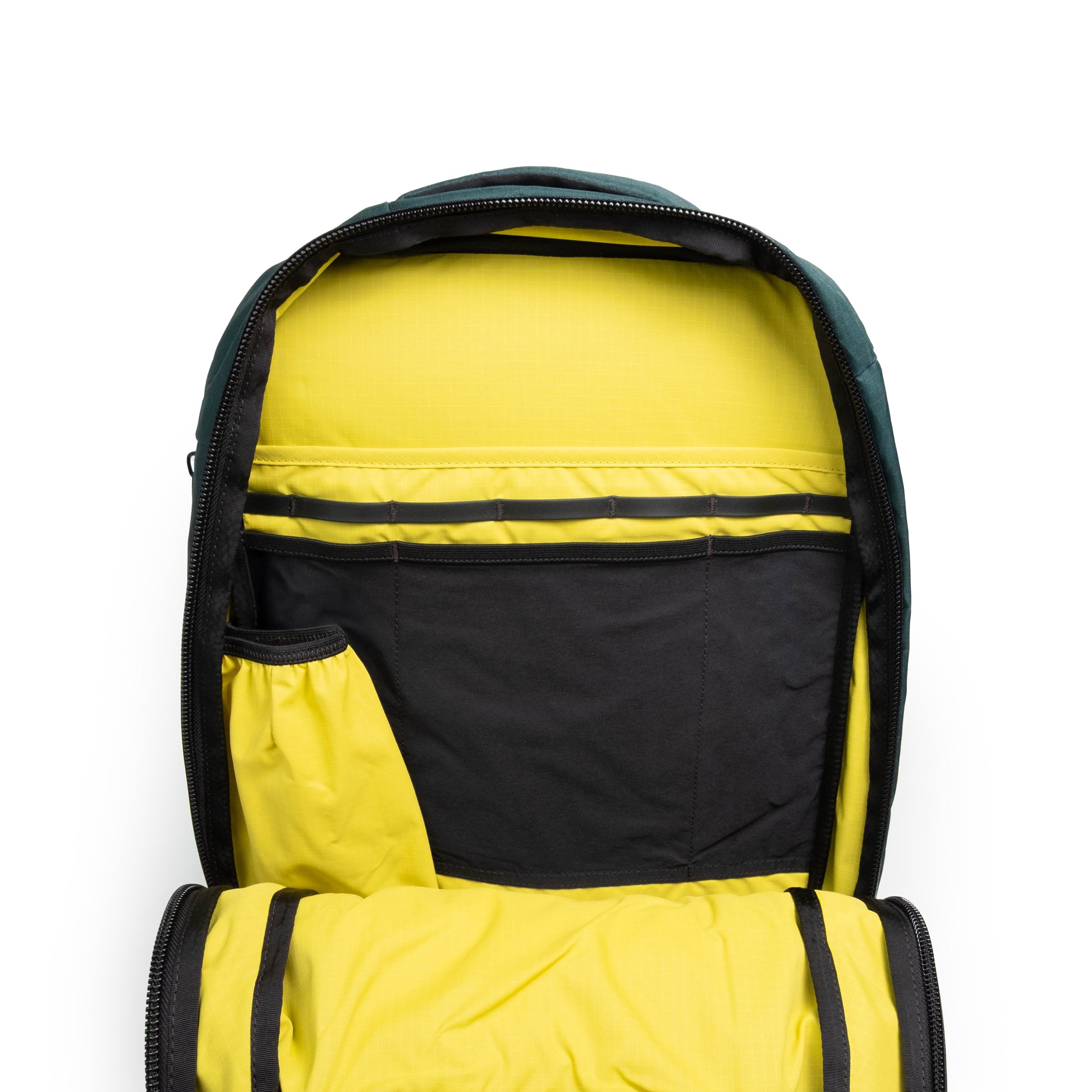 General shot of Topo Designs Global Pro Backpack showing detail shot of interior pockets and laptop sleeve