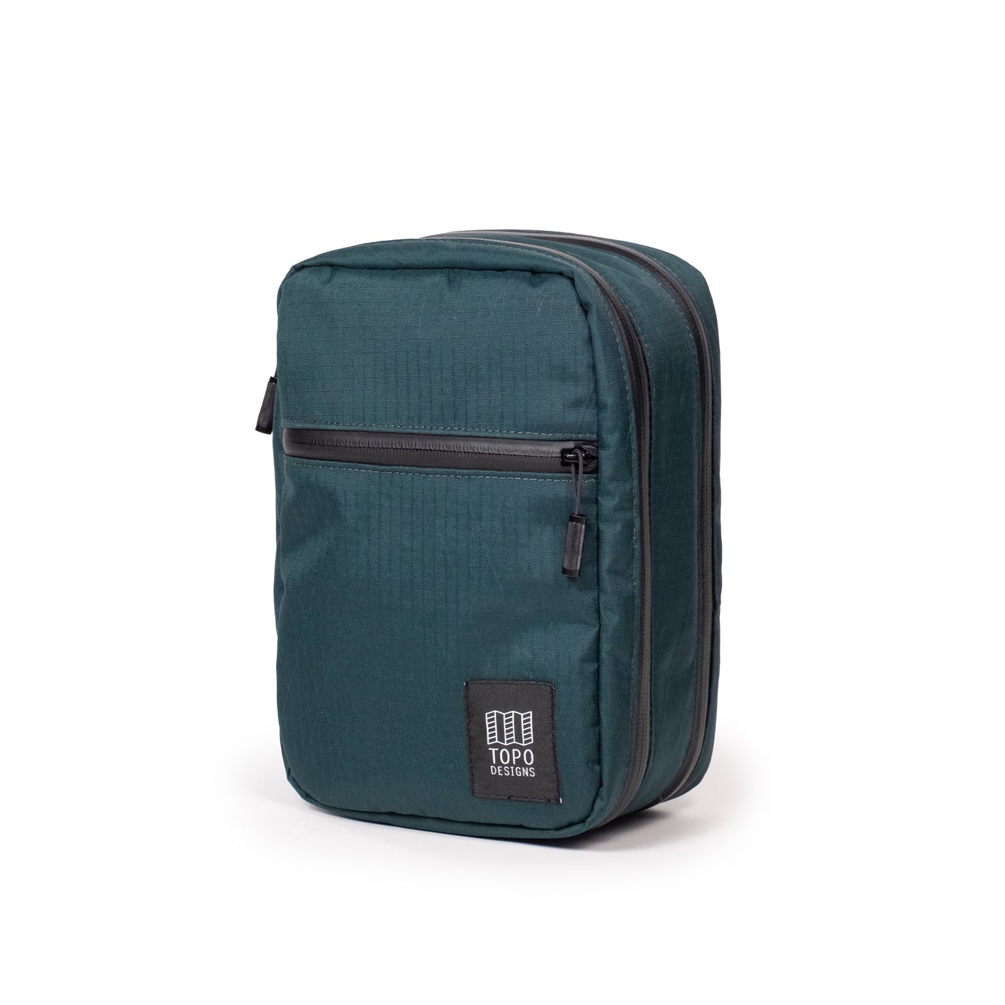 Front quarter shot of Topo Designs Global Pro Tech Case in "Dark Pine"