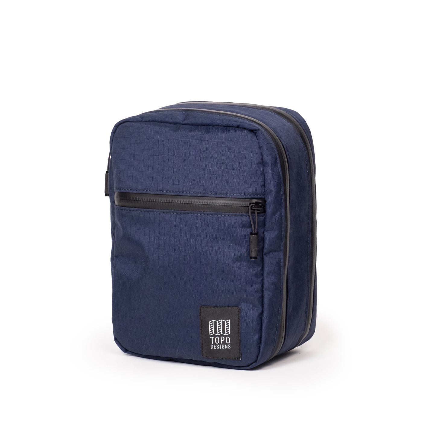 Front quarter shot of Topo Designs Global Pro Tech Case in "Midnight"