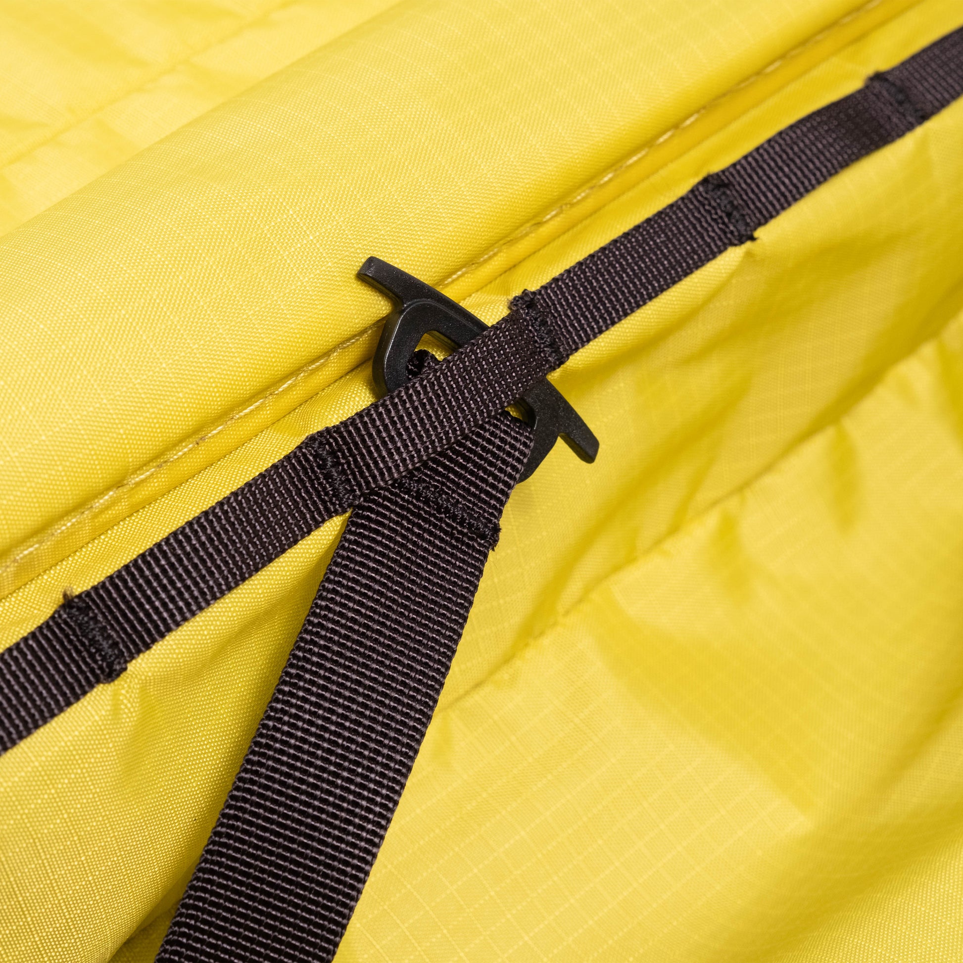 General detail shot of Topo Designs Global Pro Travel Roller Bag showing daisy chain detail inside bag