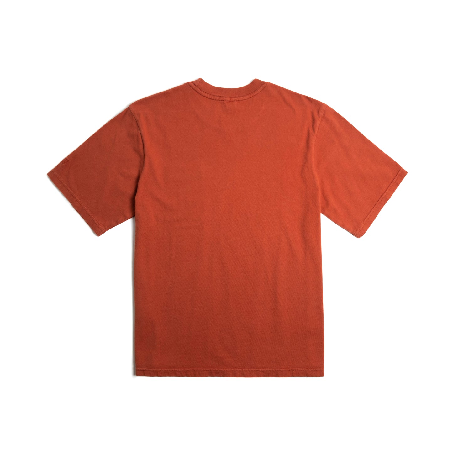 Back flat lay image on white background of Topo Designs Dirt Pocket Tee - Men's in "Terracotta"