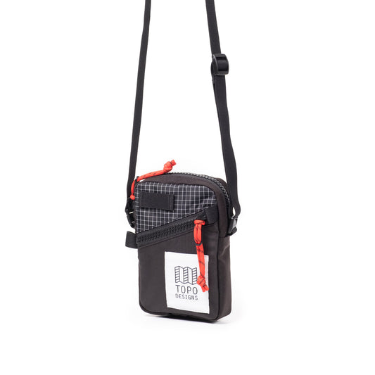 Front Quarter View of Topo Designs Mini Shoulder Bag in "Black / White Grid"