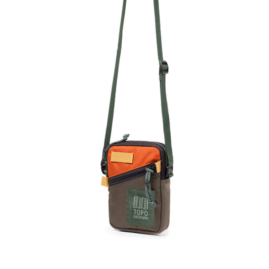 Front Quarter View of Topo Designs Mini Shoulder Bag in "Woodland / Terracotta"