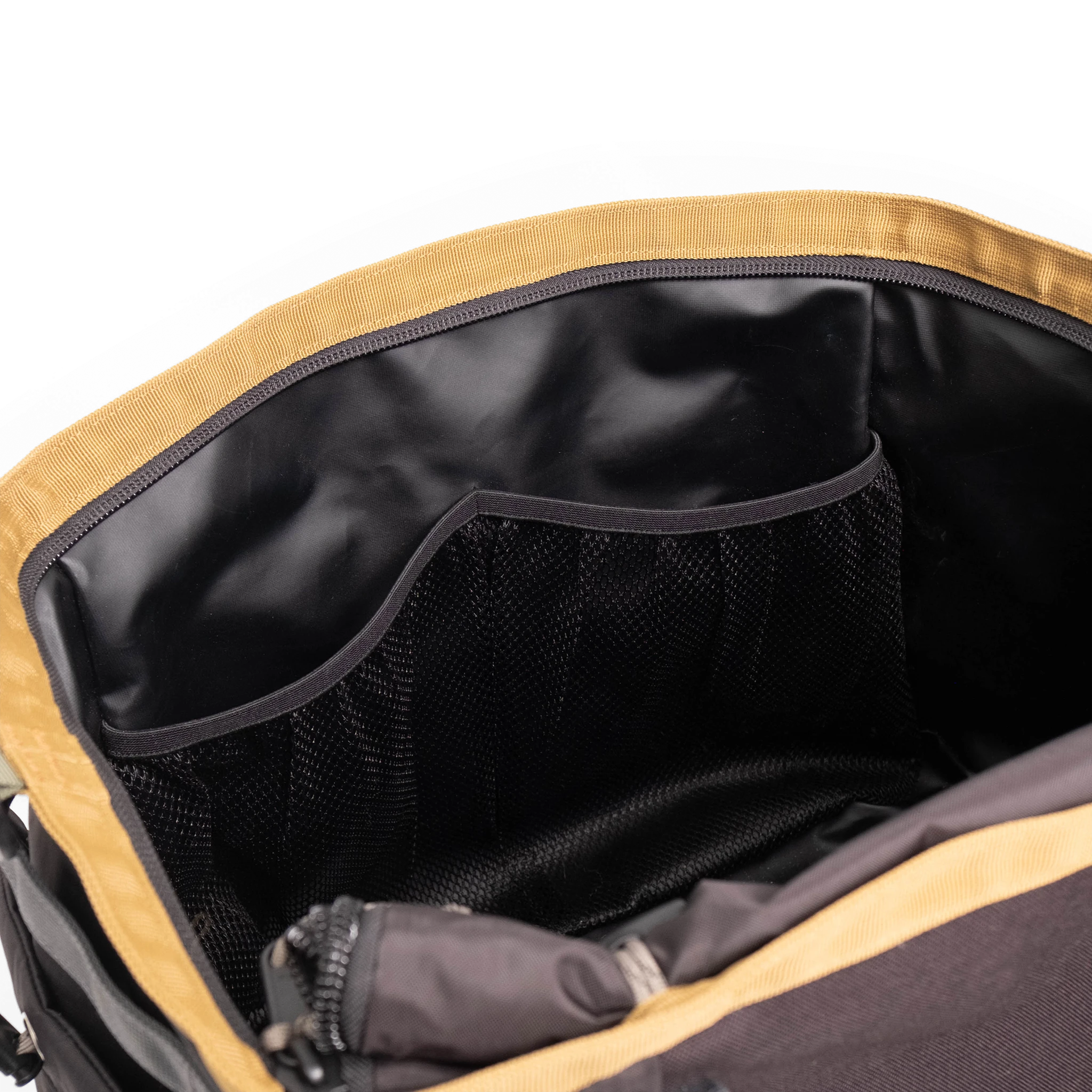 General detail shot of Topo Designs Mountain Gear Bag in "Black / Neutral" showing interior pockets.