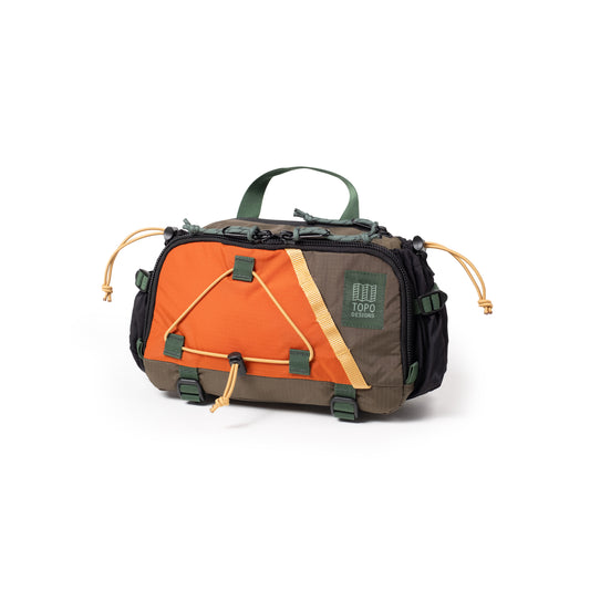 Quarter View of Topo Designs Mountain Hydro Hip Pack in "Woodland / Terracotta"