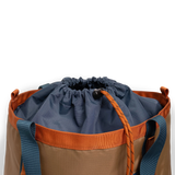 General detail shot of Topo Designs Mountain Utility Tote cinch top enclosure in "Olive / Dark Khaki".