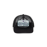 Front white background image of Topo Designs Patch Mesh Trucker - Desert Dusk in "Black"