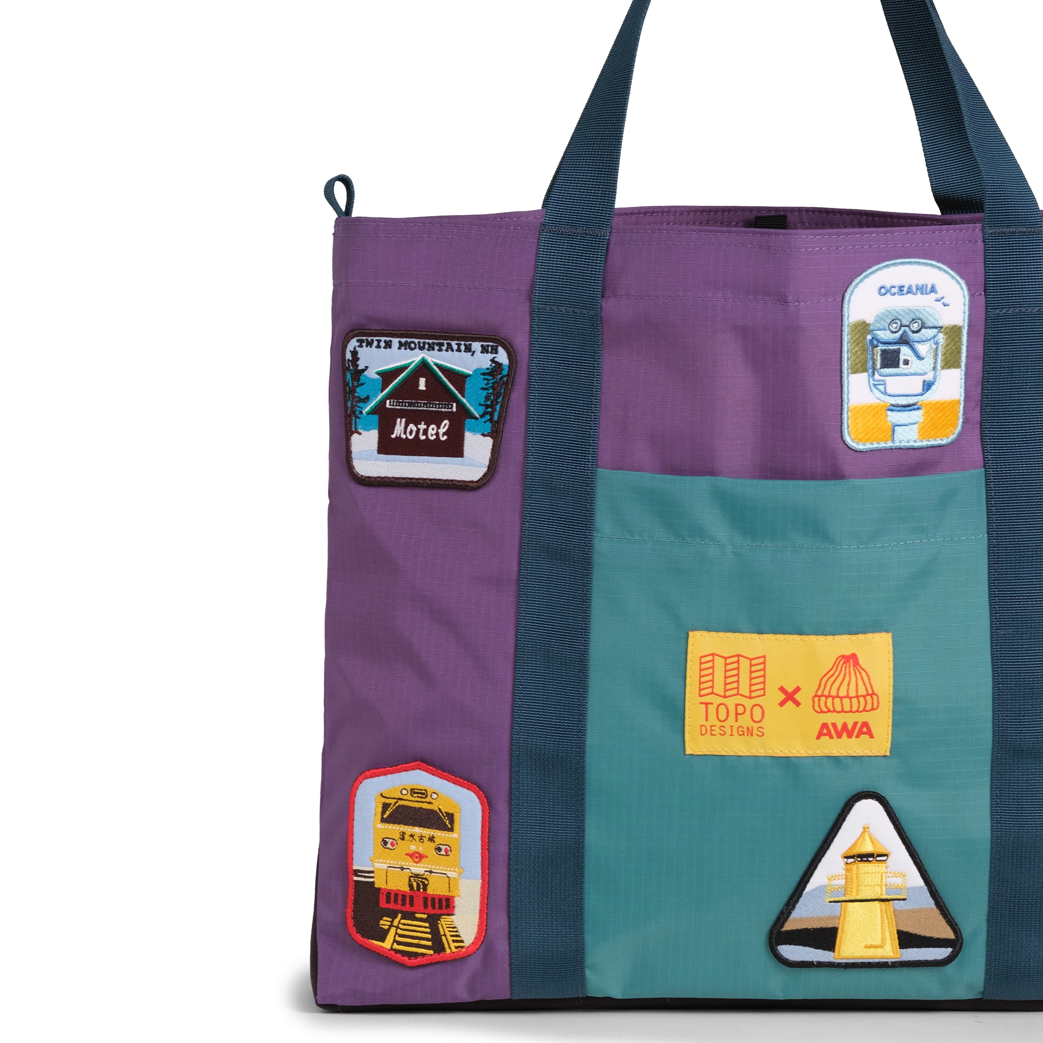 Front exterior detail image of Topo Designs x AWA Mountain Essential Tote in "Loganberry / Caribbean"