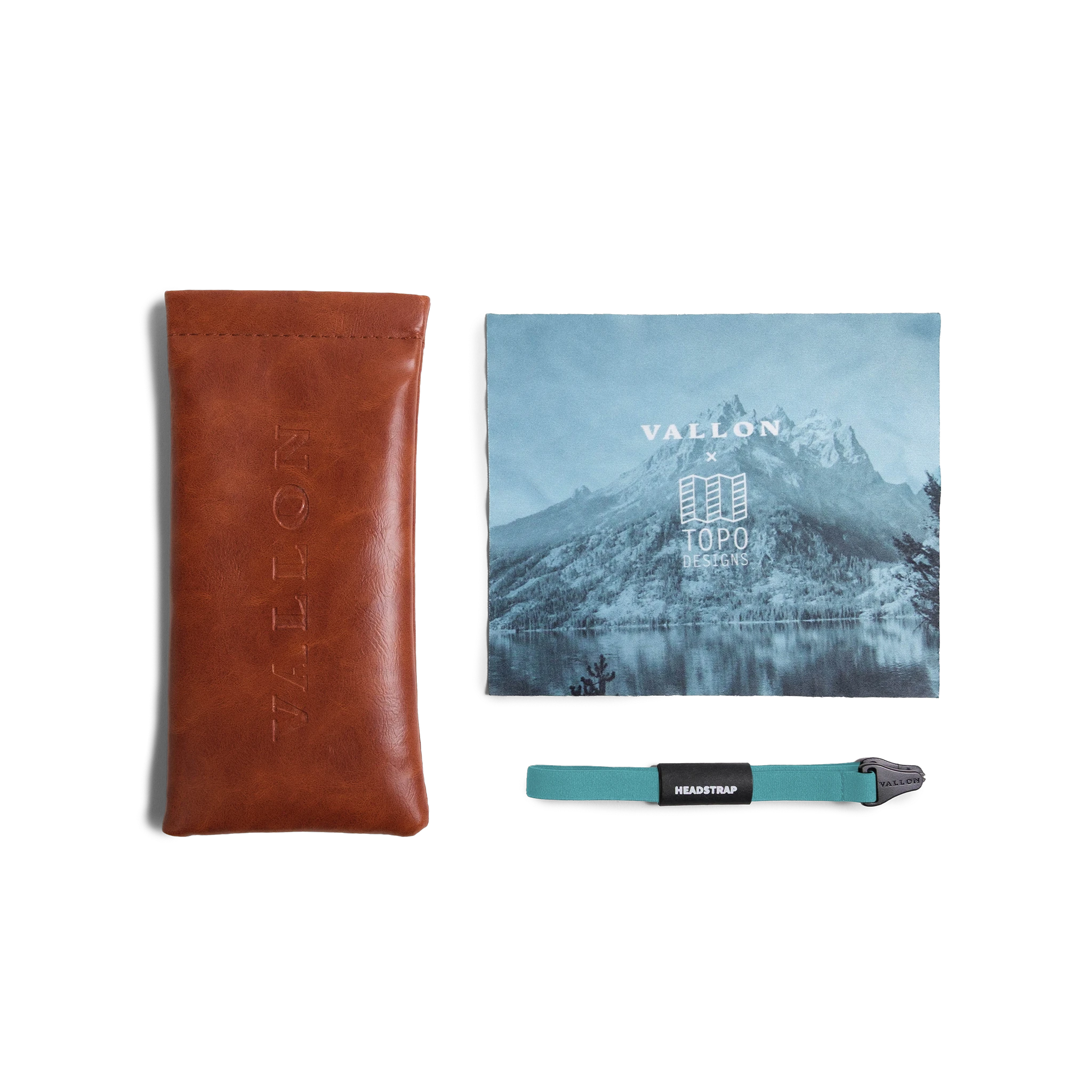 General view of VALLON X Topo Designs sunglasses accessories in "Brown / Brown" with microfiber cloth, leather sunglasses case, and sunglasses strap.