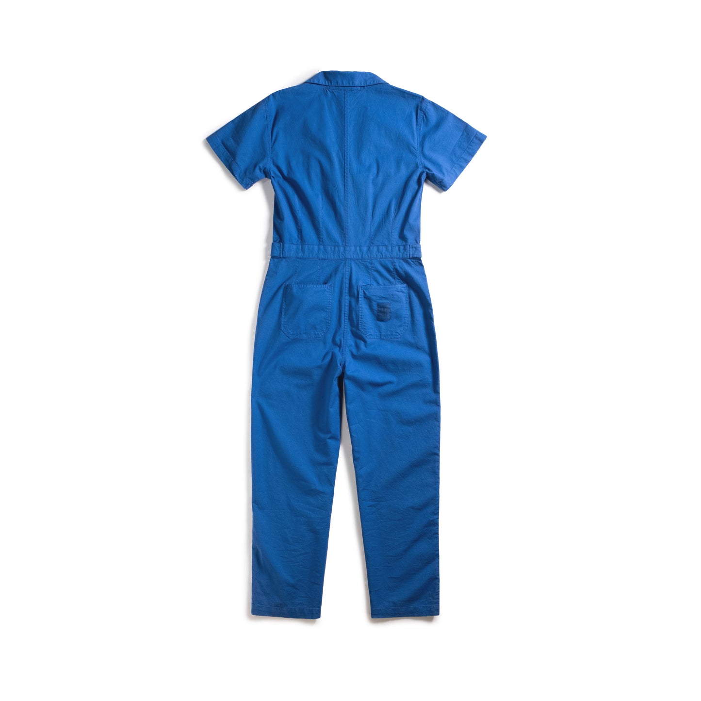 Back white background flat lay image of Topo Designs Desert Coverall - Women's in "French Blue"