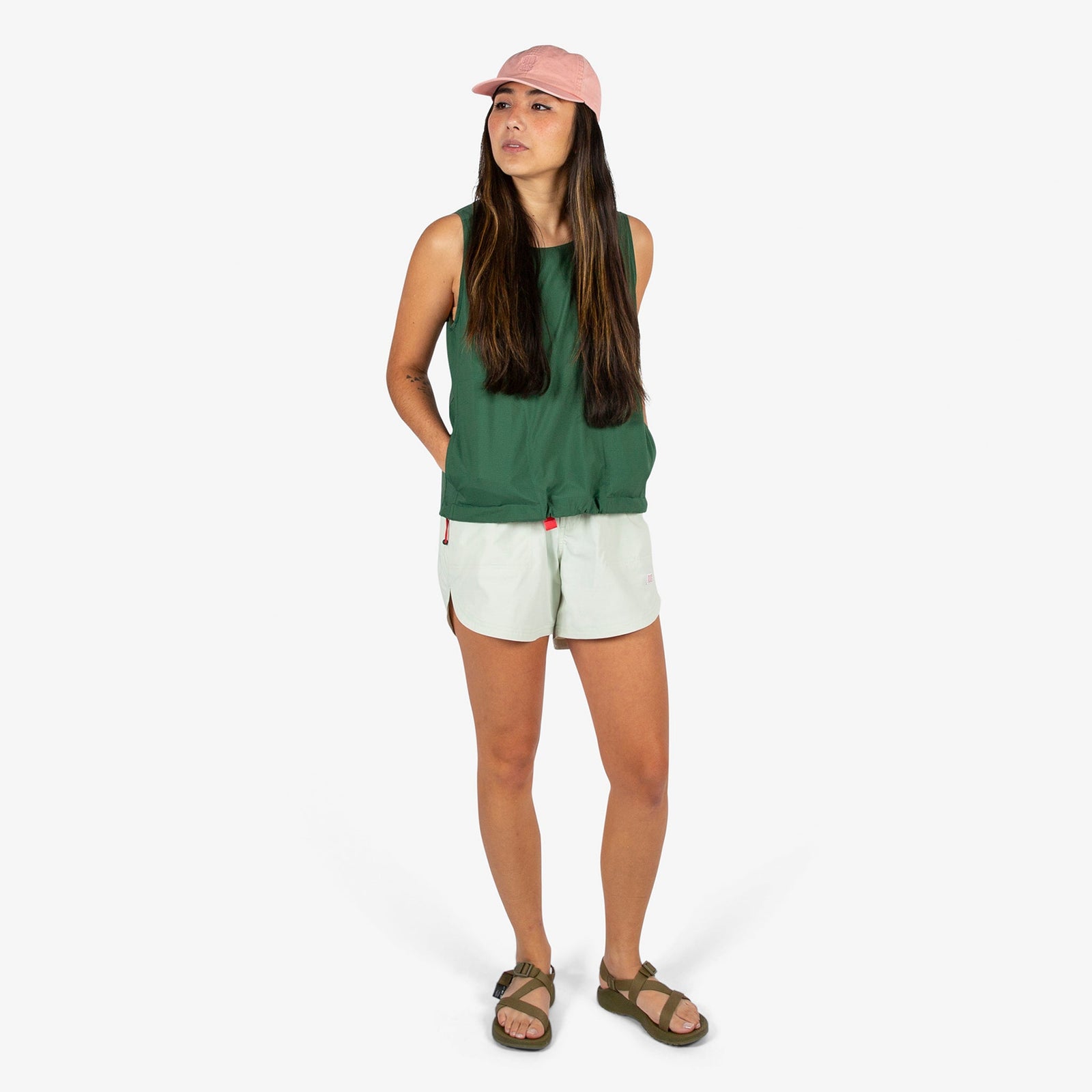 General shot of Topo Designs Women's River quick-dry swim Shorts in light mint on model.
