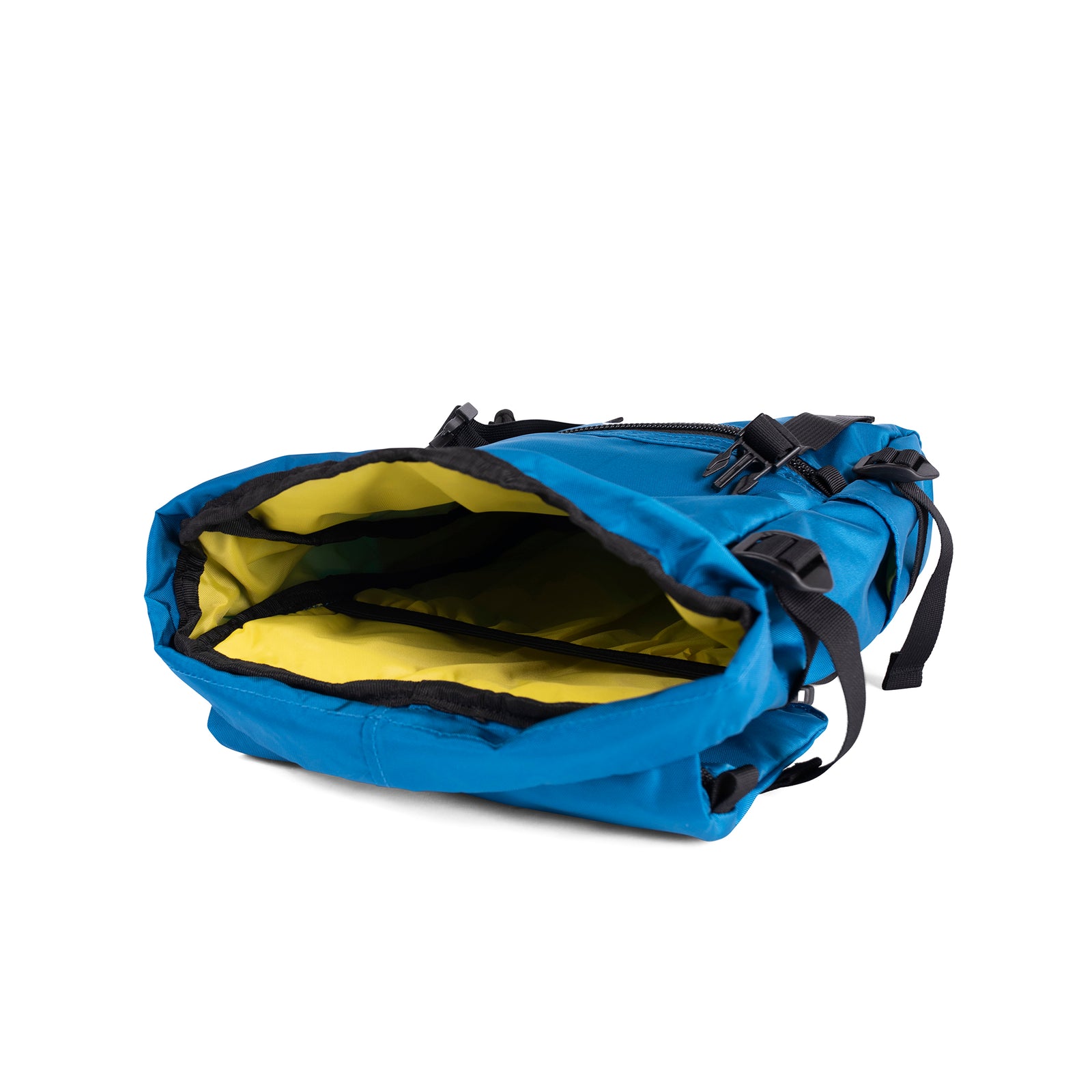General detail shot of the Topo Designs Rover Pack Mini in Blue showing yellow inside of bag.