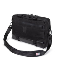 General shot of Topo Designs Made in the USA Commuter Briefcase Heritage Canvas in "Black Canvas / Black Leather" showing padded shoulder strap.