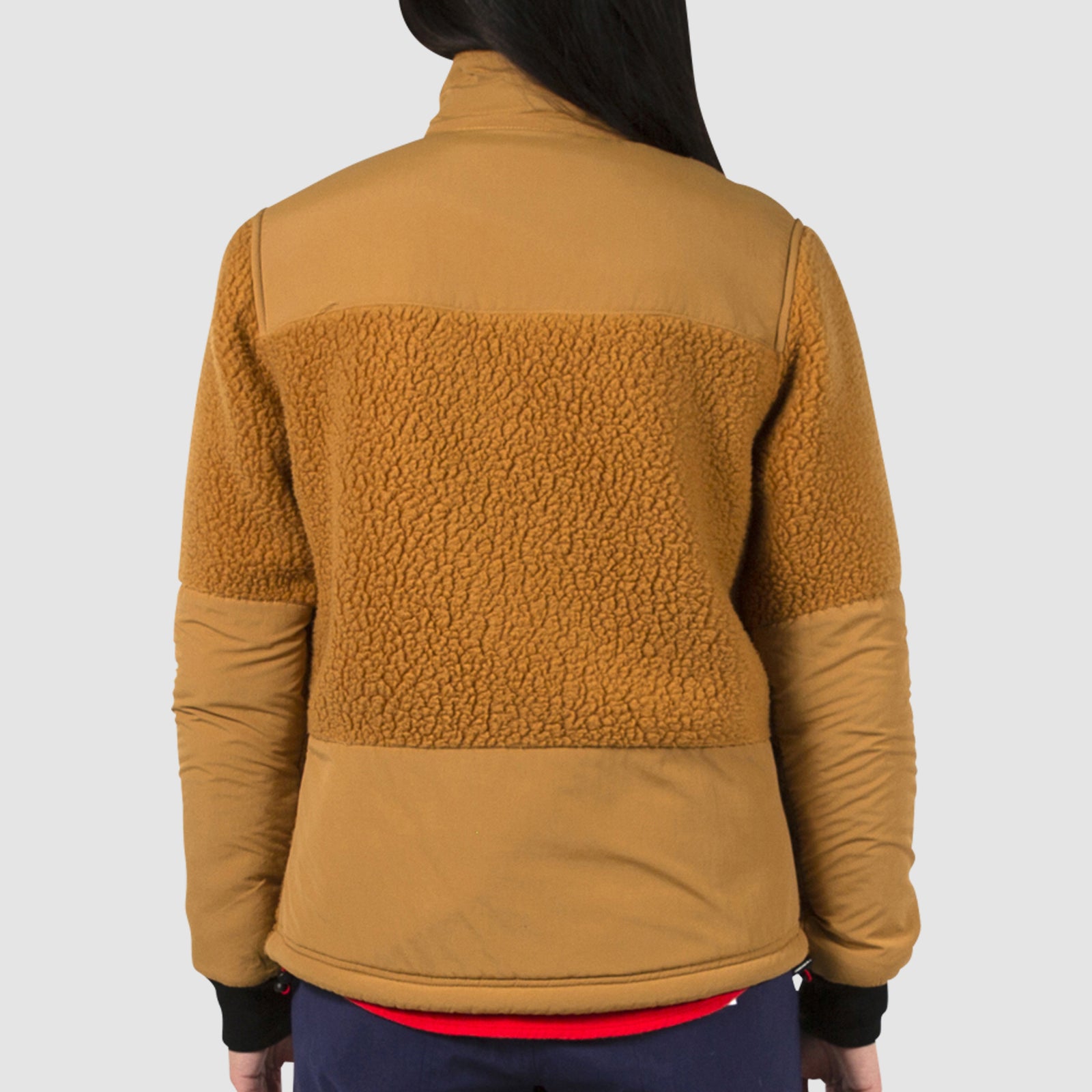 General back model shot of the women's subalpine fleece in khaki.