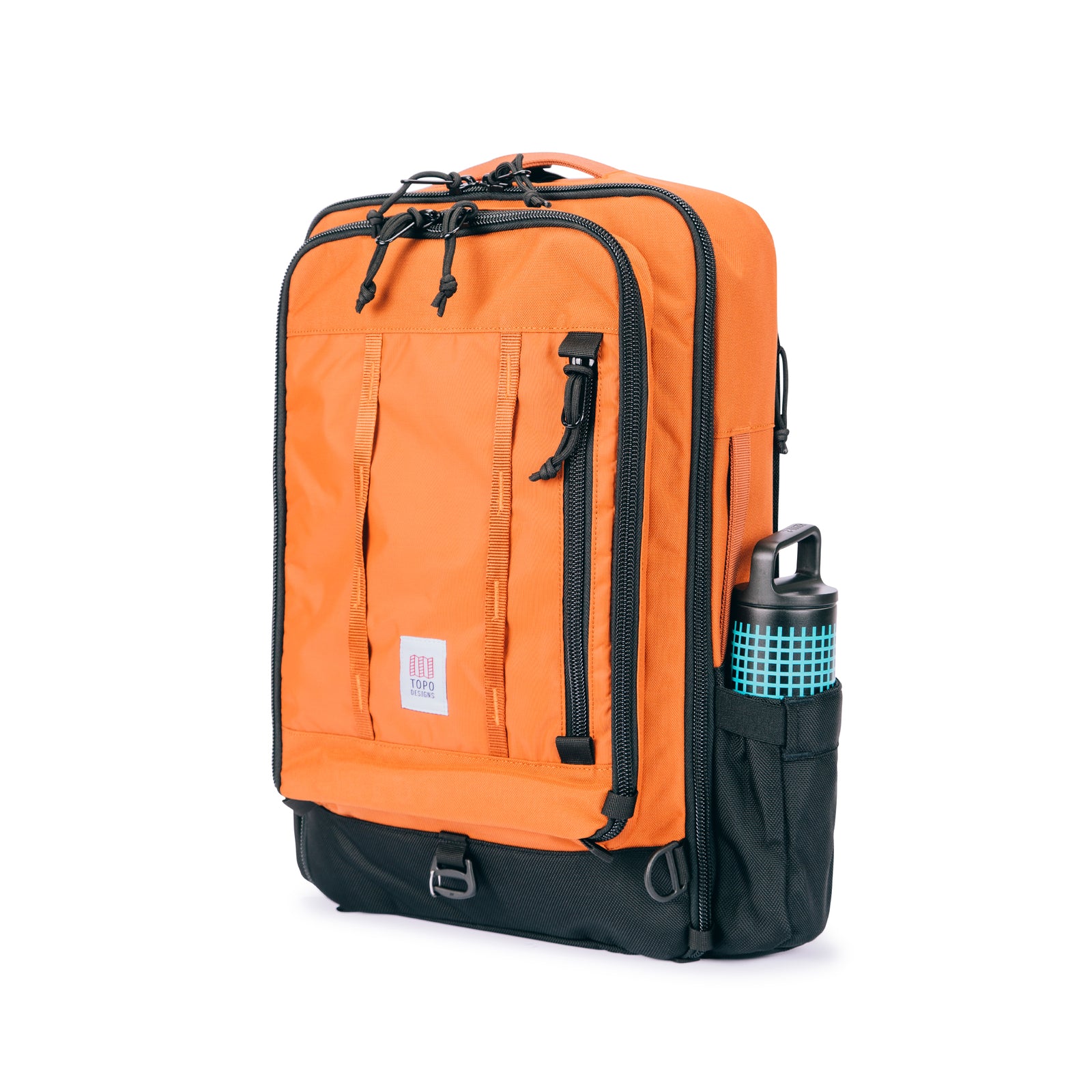 General shot of Topo Designs Global Travel Bag 30L Durable Carry On Convertible Laptop Travel Backpack in Clay orange with water bottle in expandable side pocket.