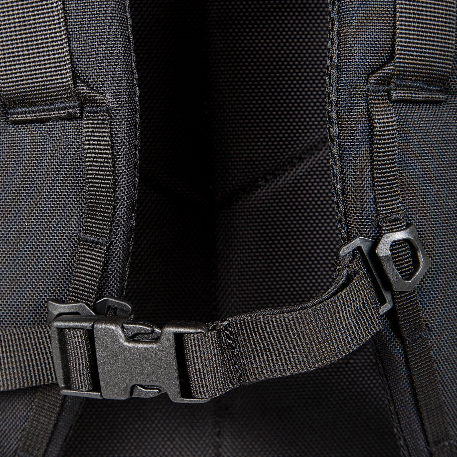 General shot of sternum strap on Topo Designs Global Travel Bag 30L Durable Carry On Convertible Laptop Travel Backpack