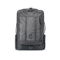 Topo Designs Global Travel Bag 30L Durable Carry On Convertible Laptop Travel Backpack in "Black".