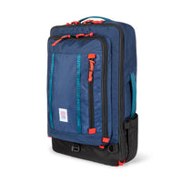 Topo Designs Global Travel Bag 40L Durable Carry On Convertible Laptop Travel Backpack in "Navy" blue.