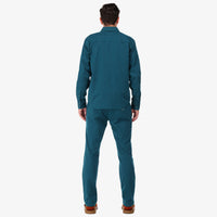 Topo Designs Men's Dirt Shirt long sleeve organic cotton button-up in "pond blue" on model back, show on "dark khaki", "charcoal", and "brick"