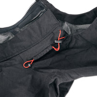 General shot of hood cinch cords on Topo Designs Men's Mountain Parka waterproof shell jacket in black.