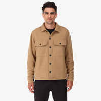 General shot of Topo Designs Men's recycled sustainable Wool Shirt in "Camel" brown on model front.